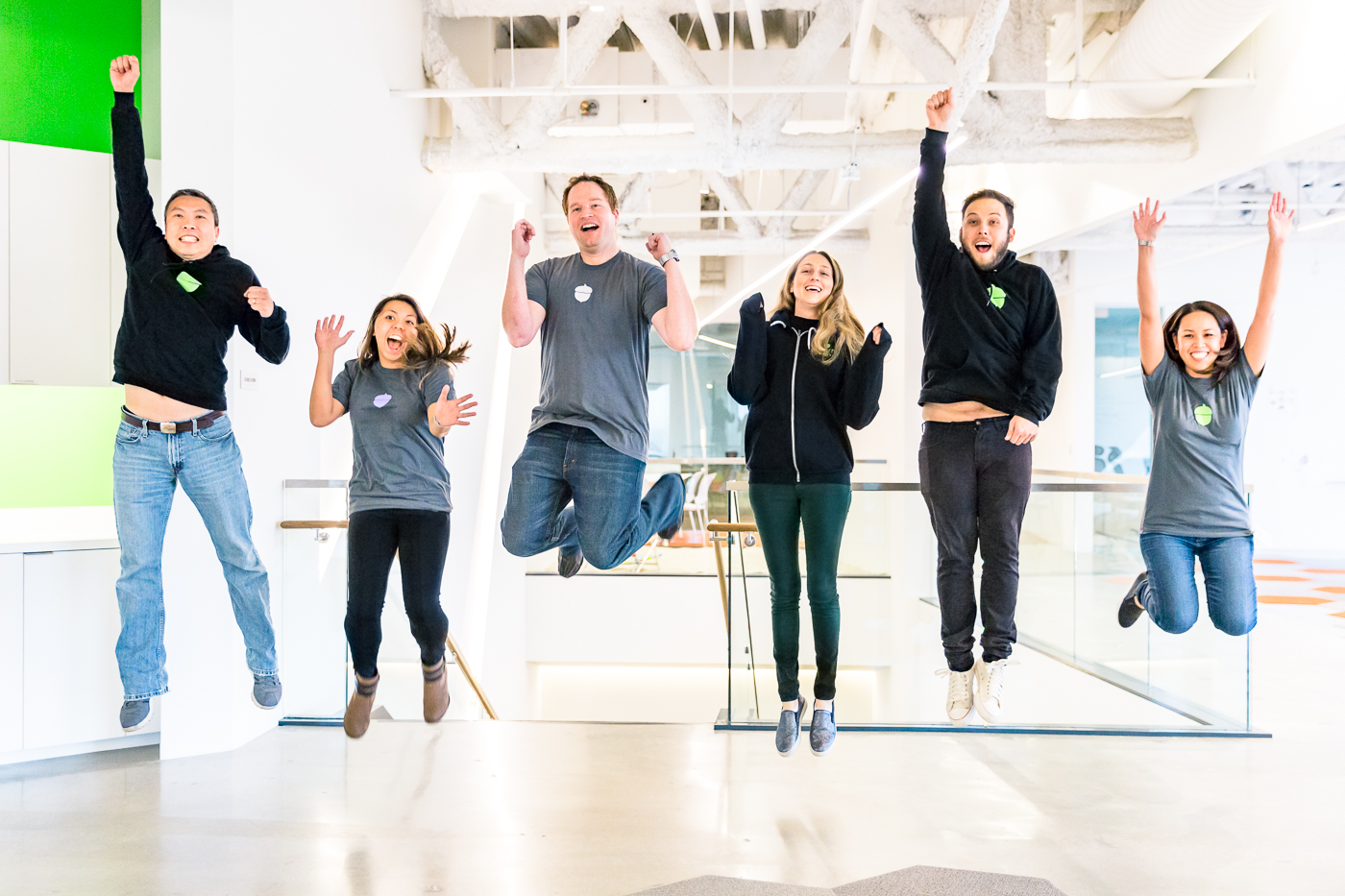 The Acorns team mid-jump